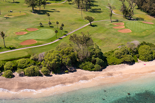 view of hole on course against the coast